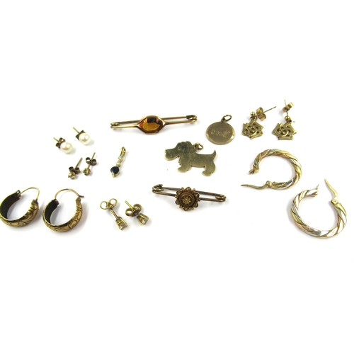 774 - Two 9ct gold charms, various other items of 9ct and unmarked yellow metal, earrings, eat studs and b... 