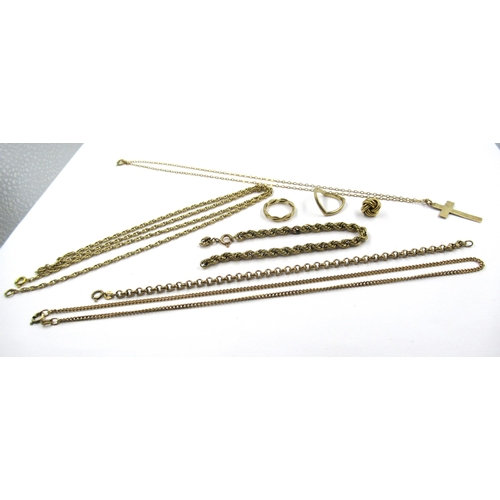 810 - Three various 9ct gold neck chains, a 9ct gold pendant cross, two 9ct gold bracelets, 9ct ring and a... 