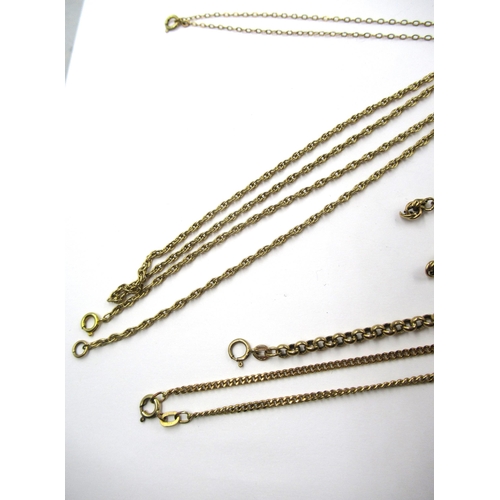 810 - Three various 9ct gold neck chains, a 9ct gold pendant cross, two 9ct gold bracelets, 9ct ring and a... 