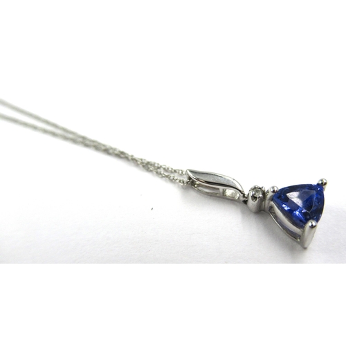 811 - 14ct White gold tanzanite and diamond pendant, on a 14ct white gold chain