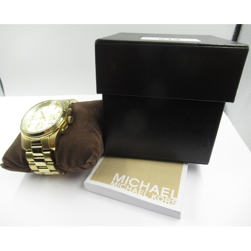 814 - Michael Kors, gold plated quartz wristwatch in original box