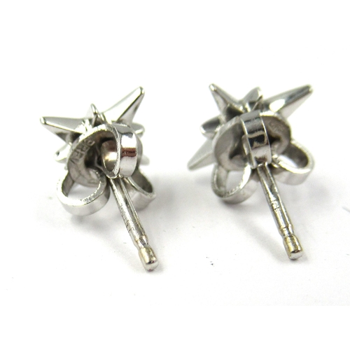 817 - Pair of Venyx 18ct white gold diamond set star cluster stud earrings, in a fitted box