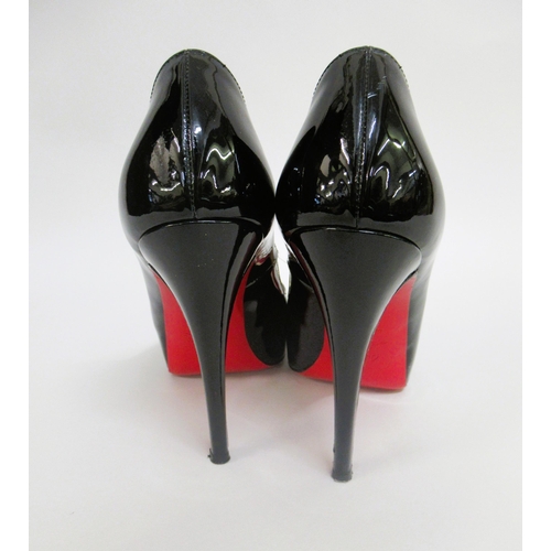 82 - Christian Louboutin, Paris, black patent leather peep toe court shoes, size 39