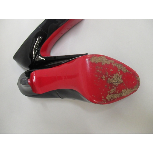 82 - Christian Louboutin, Paris, black patent leather peep toe court shoes, size 39