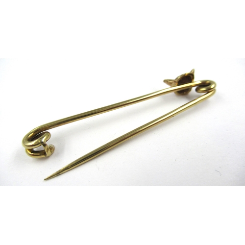 823 - 9ct Gold and ruby fox head stickpin