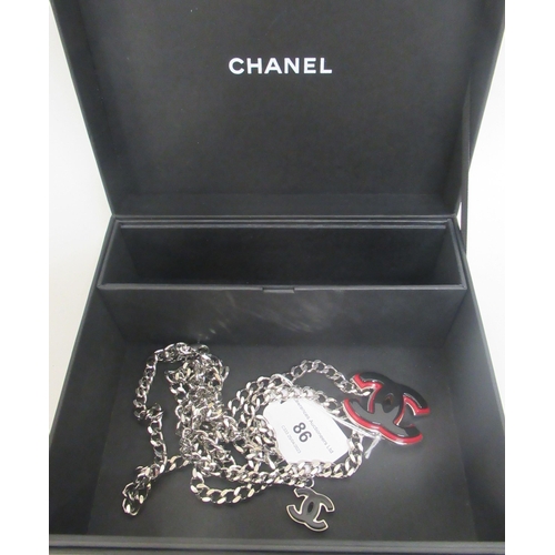 86 - Chanel, 2005, chain link belt with red and black enamel logos, in a Chanel box