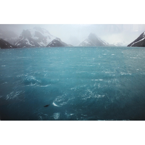 875 - Group of ten large scale adventure photographs, signed by the photographer, each approximately 80cms... 