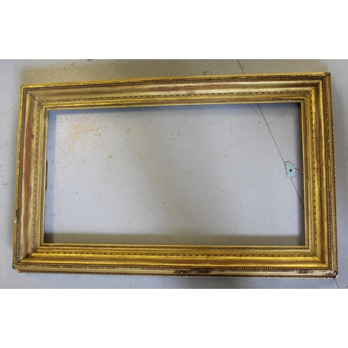 893 - Two 19th Century gilt frames, apertures, 65cms x 35cms and 65cms x 34cms