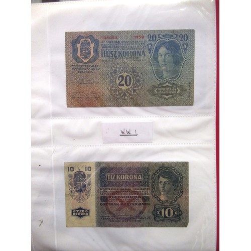 807 - Two folders containing a quantity of World bank notes