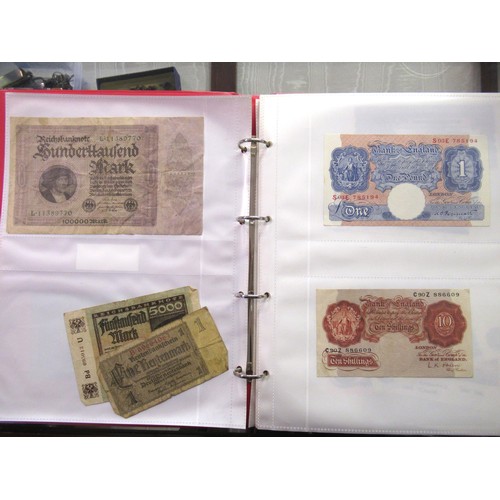 807 - Two folders containing a quantity of World bank notes