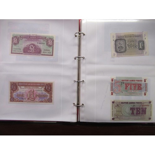 807 - Two folders containing a quantity of World bank notes