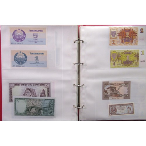 807 - Two folders containing a quantity of World bank notes