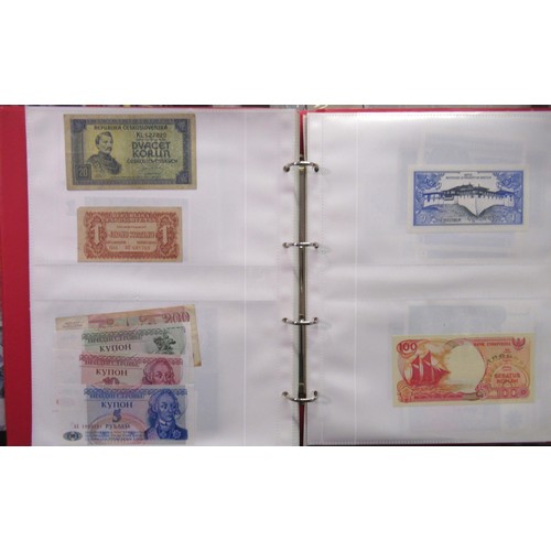 807 - Two folders containing a quantity of World bank notes