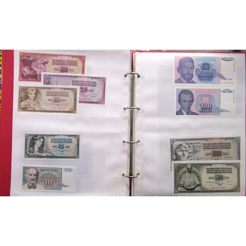 807 - Two folders containing a quantity of World bank notes