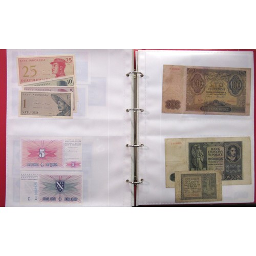 807 - Two folders containing a quantity of World bank notes