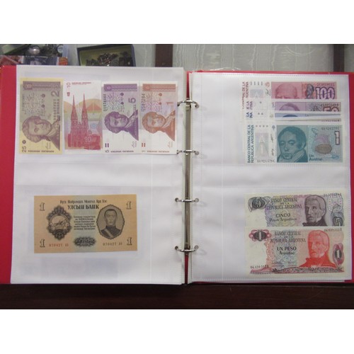 807 - Two folders containing a quantity of World bank notes