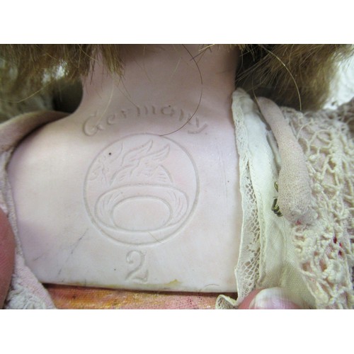 195 - Early 20th Century German bisque headed doll with sleeping eyes, open mouth and four teeth on a join... 