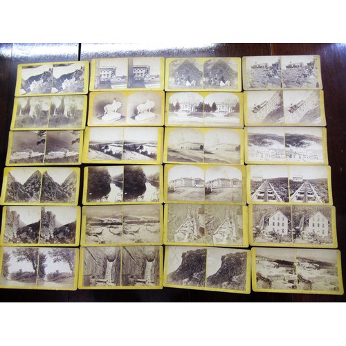 197 - Handheld stereoscopic viewer (at fault), together with a box containing a collection of stereoscopic... 