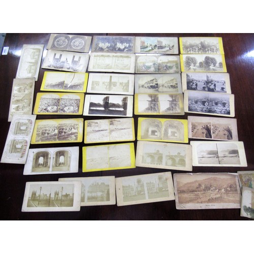 197 - Handheld stereoscopic viewer (at fault), together with a box containing a collection of stereoscopic... 