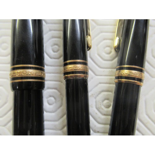 266 - Mont Blanc three piece pen set comprising fountain pen with 14ct gold nib, ballpoint pen and a prope... 