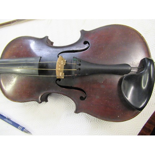 271 - Violin bearing Stradivarius label with bow, in a fitted case (14in back)