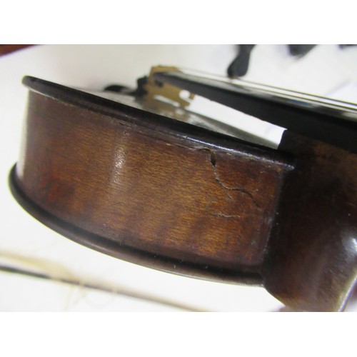 271 - Violin bearing Stradivarius label with bow, in a fitted case (14in back)