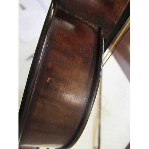 271 - Violin bearing Stradivarius label with bow, in a fitted case (14in back)