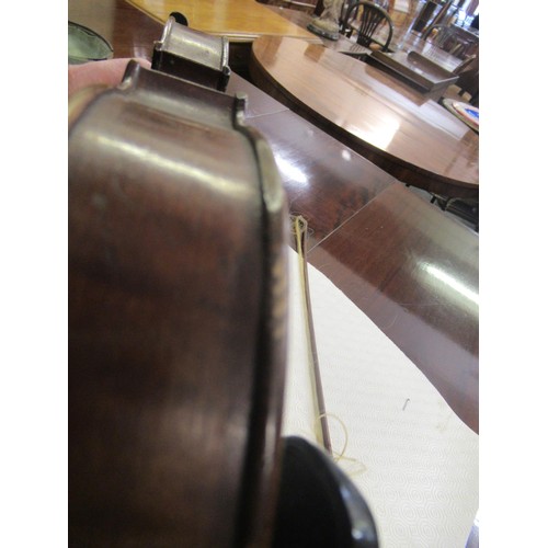 271 - Violin bearing Stradivarius label with bow, in a fitted case (14in back)