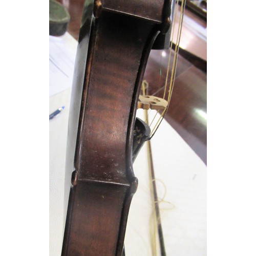 271 - Violin bearing Stradivarius label with bow, in a fitted case (14in back)