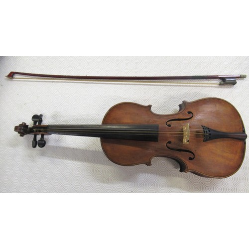 364 - Violin (14in back) and bow in a fitted case,