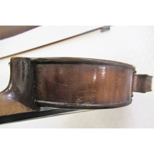 364 - Violin (14in back) and bow in a fitted case,