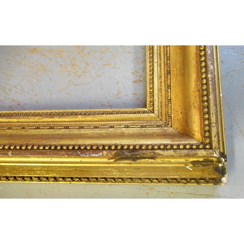 893 - Two 19th Century gilt frames, apertures, 65cms x 35cms and 65cms x 34cms