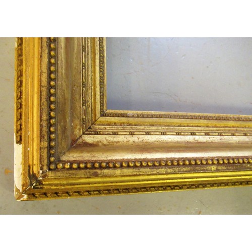 893 - Two 19th Century gilt frames, apertures, 65cms x 35cms and 65cms x 34cms