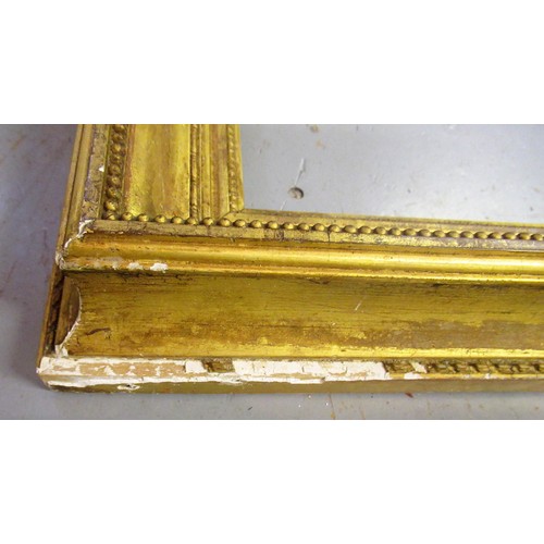 893 - Two 19th Century gilt frames, apertures, 65cms x 35cms and 65cms x 34cms