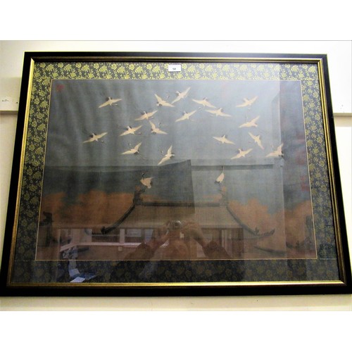 50 - 20th Century Chinese coloured print on silk, cranes in flight above a temple, 51cms x 74cms, framed