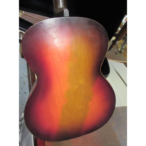 375 - Late 1950's arch top acoustic guitar by Hofner with later case (damage to neck heel)