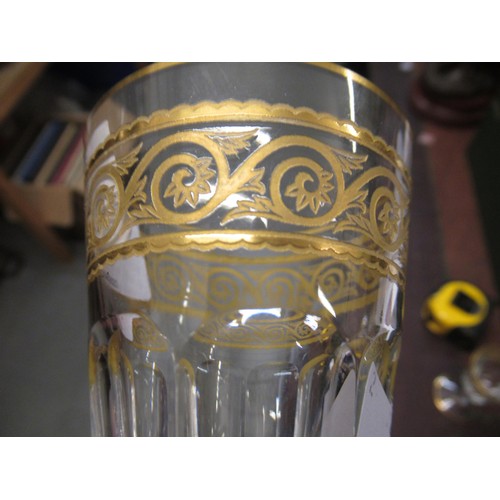 435 - Pair of Baccarat gilt and cut pedestal wine glasses