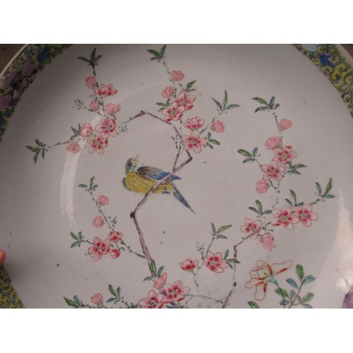 420 - Chinese circular porcelain charger, painted with a bird (chip to rim), 36cms diameter, together with... 