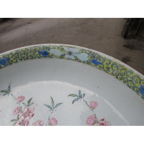 420 - Chinese circular porcelain charger, painted with a bird (chip to rim), 36cms diameter, together with... 