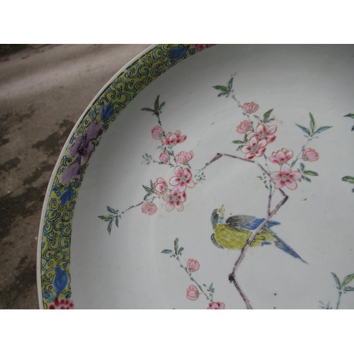 420 - Chinese circular porcelain charger, painted with a bird (chip to rim), 36cms diameter, together with... 