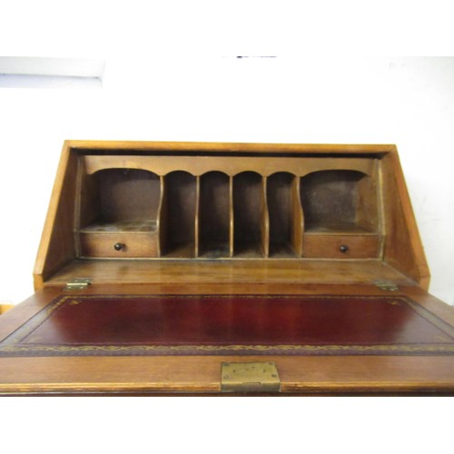 1560 - Mid 20th Century figured walnut bureau, 79cms wide together with a similar mahogany bureau