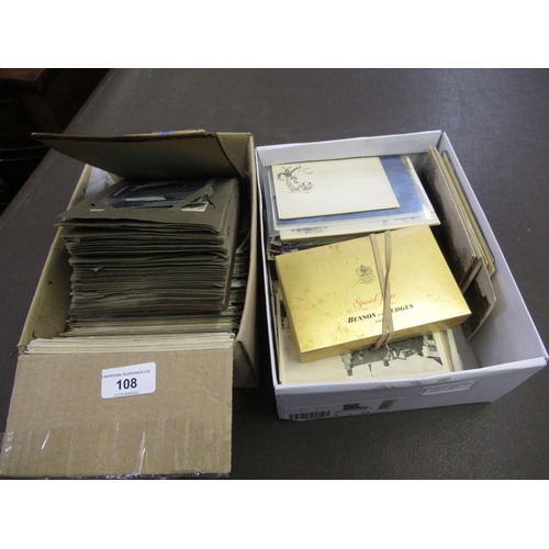 108 - Two boxes containing a collection of postcards including an album, various cigarette cards and a box... 