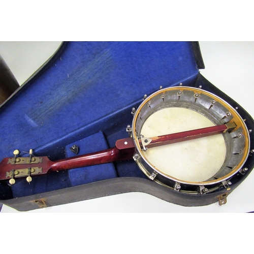 111 - Savana banjo ukulele in a fitted case