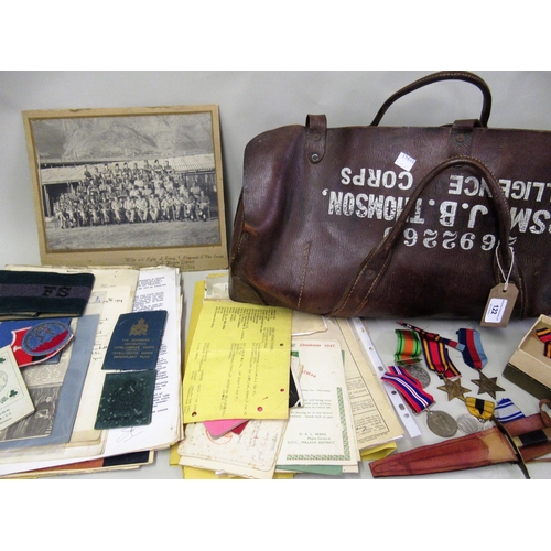 122 - Mid 20th Century leather bag containing a quantity of Intelligence Corps related ephemera