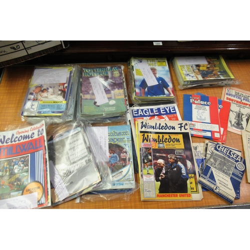 126 - Box containing a collection of various 1980's football programmes including Chelsea, Wimbledon, Mill... 