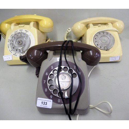 133 - 1960's Two-tone Pye telephone and two similar 1970's / 80's cream telephones