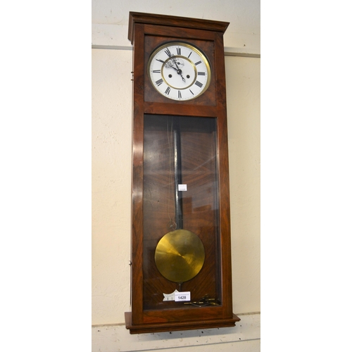 1428 - Early 20th Century walnut cased Vienna type wall clock, the rectangular case enclosing an enamel dia... 