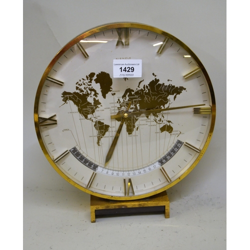 1429 - Mid Century world time clock by Kienzle, with a quartz movement, 26cms diameter