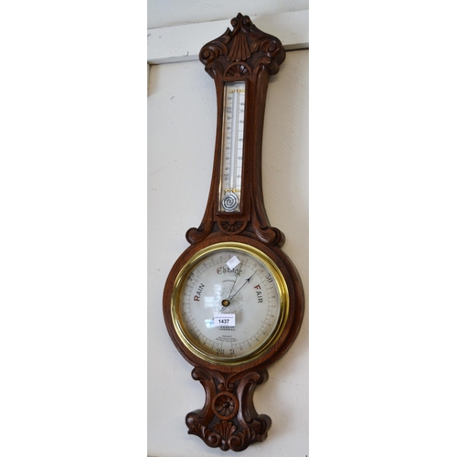 1437 - Early 20th Century carved oak banjo shaped aneroid barometer, the silvered dial signed CSSA Limited,... 