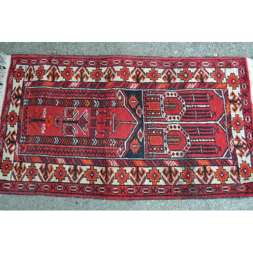 15 - Modern Afghan Belouch prayer rug, 101cms x 75cms, together with another similar, 110cms x 64cms